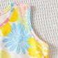Vibrant Floral Sleeveless dress with belt for girls